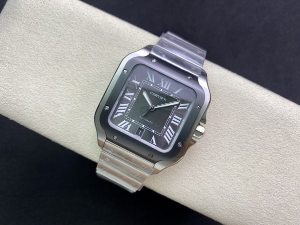 SANTOS DE CARTIE LARGE STEEL CASE BLACK BEZEL WHITE DIAL