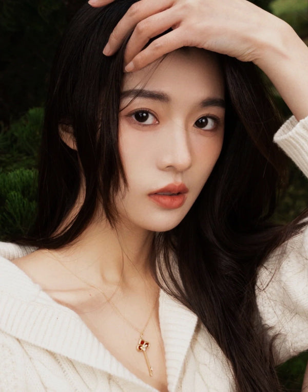 COLLANA IN ORO ROSA CON DIAMANTI E CORNIOLA FLEUR DE LIS