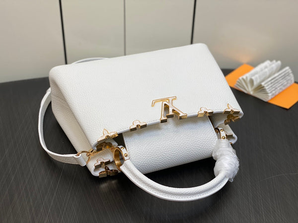 CAPUCINES MM 31 BIANCO TAURILLON ORO HARDWARE