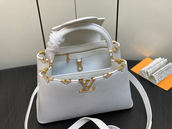 CAPUCINES MM 31 BIANCO TAURILLON ORO HARDWARE