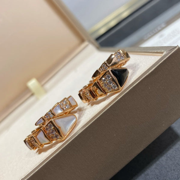 ANELLO SERPENTI ORO DIAMANTI ONICE