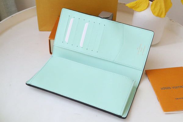 PORTAFOGLIO VERTICALE CAPUCINES GRIGIO