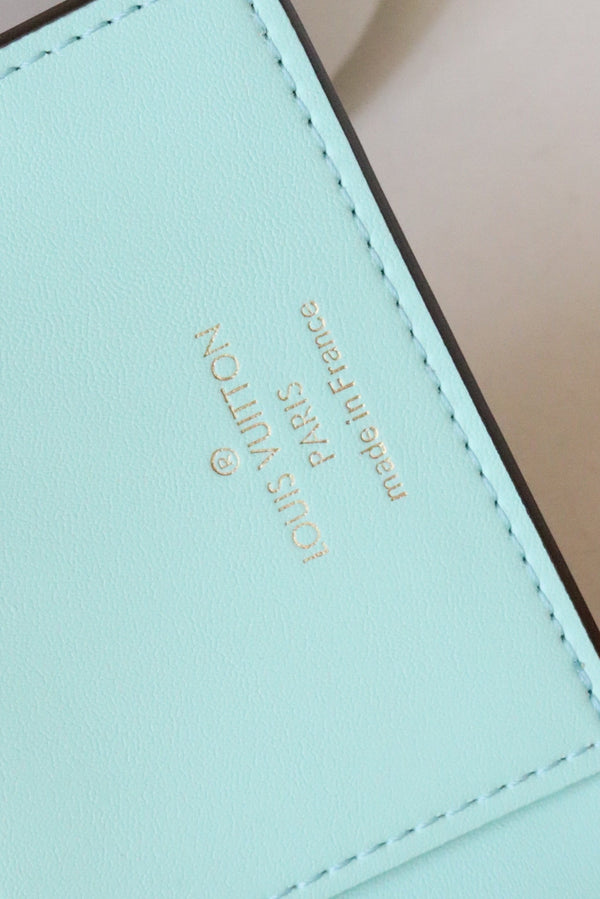 PORTAFOGLIO VERTICALE CAPUCINES GRIGIO