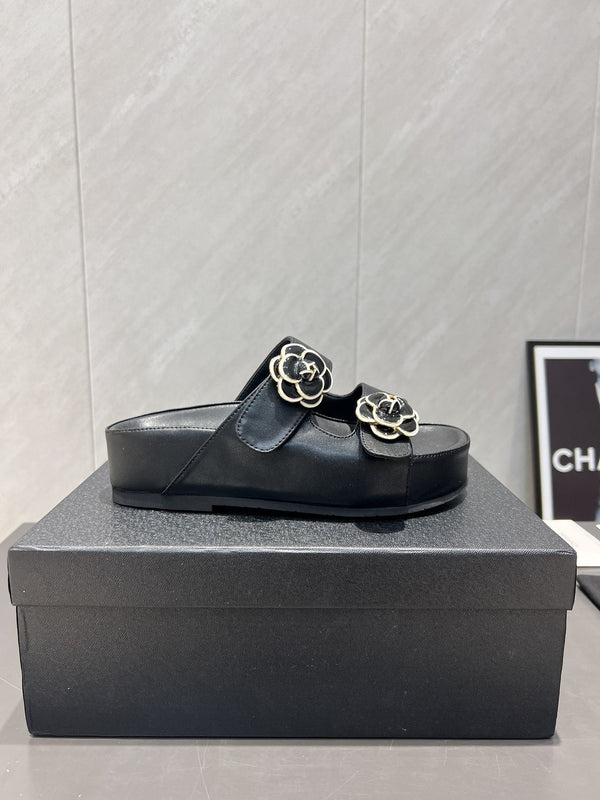 CC 25SS Flower Buckle Platform Beach Slides in Black Cowhide