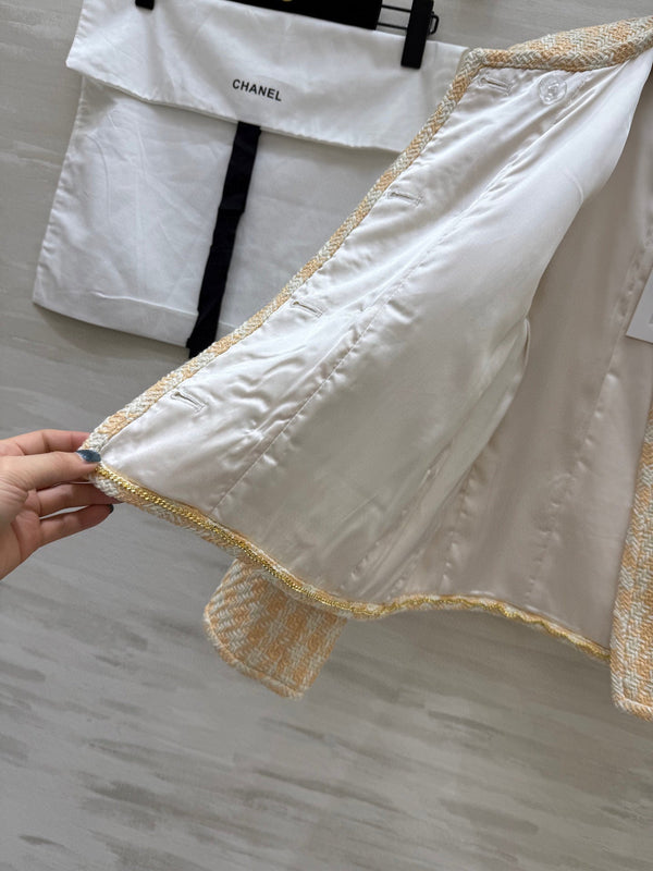 CC 25C Giacca intrecciata delicata in tweed arancione