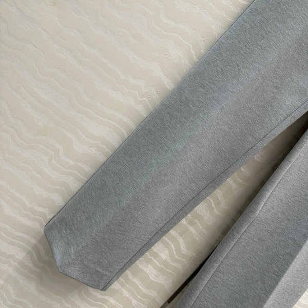 Pantaloni a vita bassa Miumiu in cotone grigio