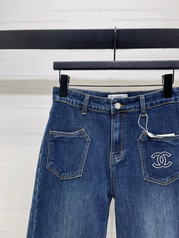 CC 25 Pocket-embroidered high-waisted straight-leg jeans