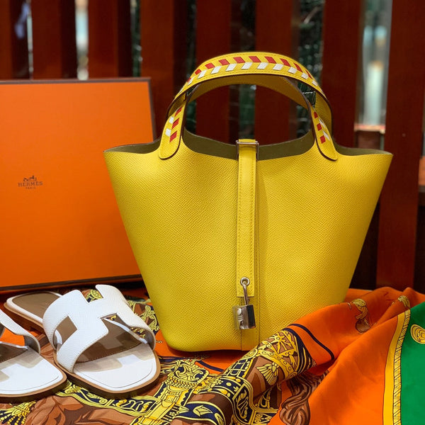 HM PICOTIN LOCK 18 LEMON EPSOM WITH BRAID STRAP