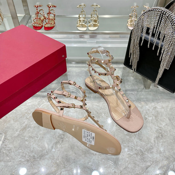 SANDALO INFRADITO ROCKSTUD CON CINTURINI IN PELLE DI VITELLO ROSA CHIARO