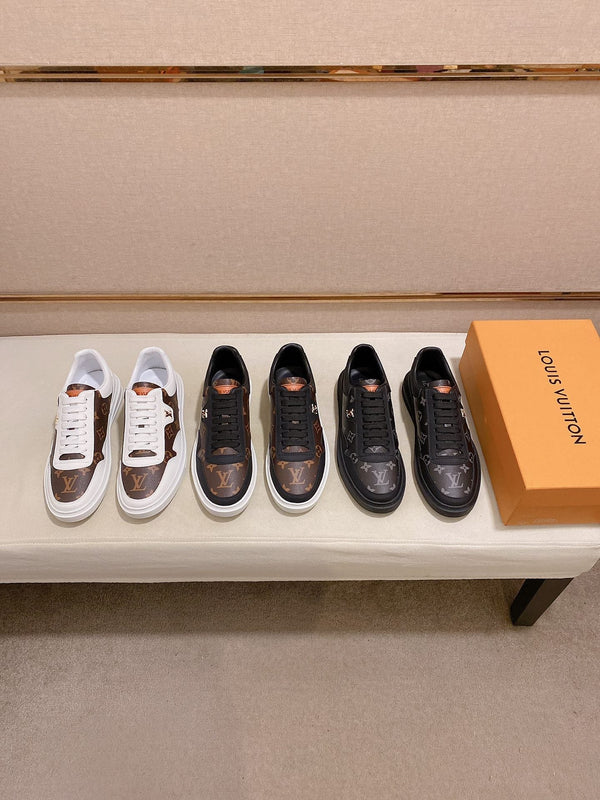 LV TRAINER IN BLACK MIX CHOCOLATE BROWN CALFSKIN