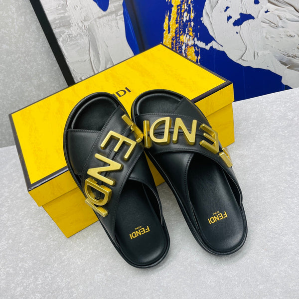FENDI GRAPHY LOGO LETTERING SLIDES IN BLACK LAMBSKIN WITH GOLD HARDWARE