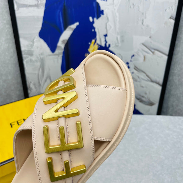 FENDI GRAPHY LOGO LETTERING SLIDES IN BEIGE LAMBSKIN WITH GOLD HARDWARE