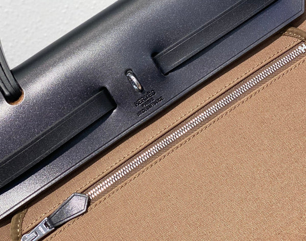 Herbag 31 Toile Brown Canvas Black Cowhide Leather