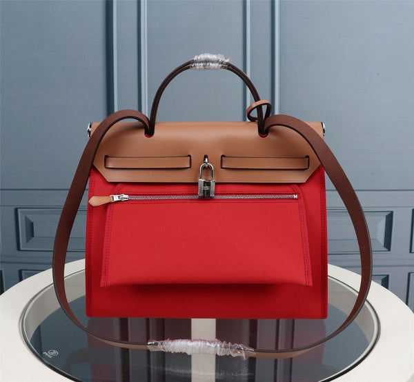 HM HERBAG ZIP 31 RED AND CIDER CANVAS