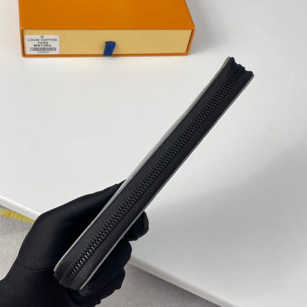 LV M81384 Zippy Vertical Wallet Monogram Shadow Calf Leather 221623