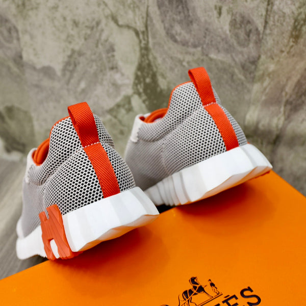 HM BOUNCING SNEAKER IN TESSUTO TRASPIRANTE NUVOLA E ARANCIONE