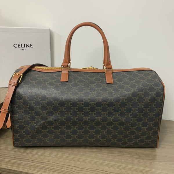 TRAVEL BAG 50 IN BLACK TRIOMPHE CANVAS WITH CELINE PRINT