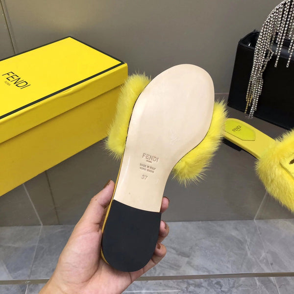 FENDI BAGUETTE MINK SLIDE SLIPPER IN BRIGHT YELLOW FUR