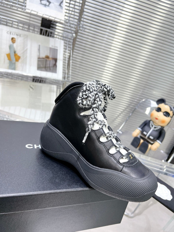 CC CANO ALTO SNEAKER IN BLACK CALFSKIN AND RUBBER