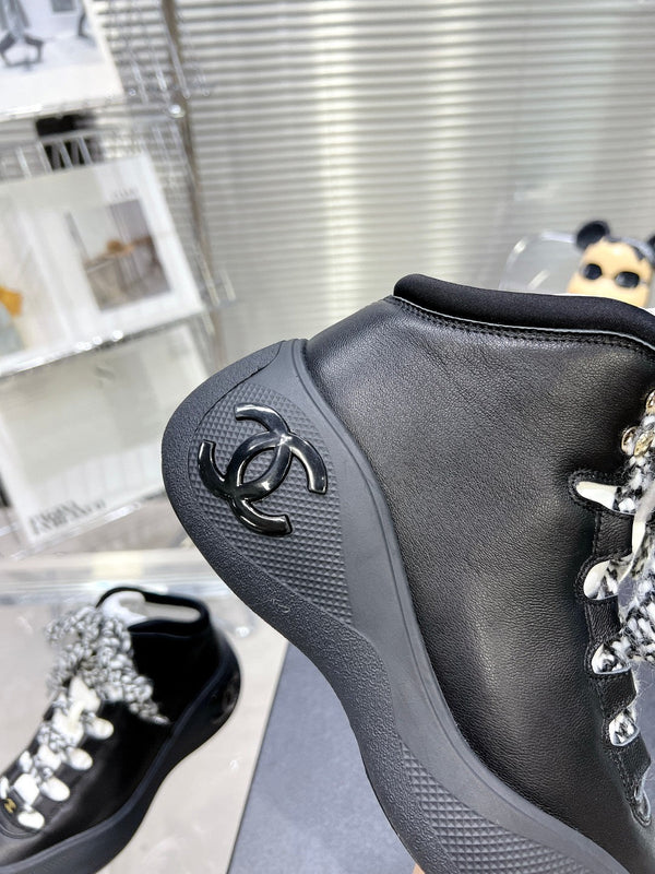 CC CANO ALTO SNEAKER IN BLACK CALFSKIN AND RUBBER