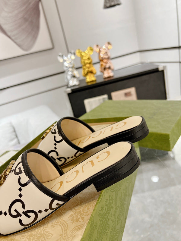 SANDALO SLIDE GG ESCLUSIVO IN PELLE DI VITELLO NERA E CREMA