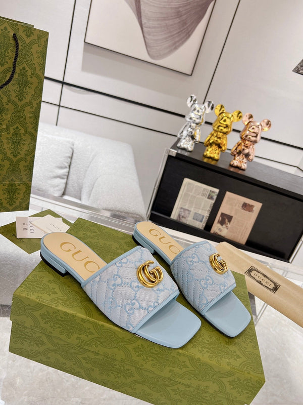 SANDALO SLIDE ESCLUSIVO GG IN TESSUTO CIELO