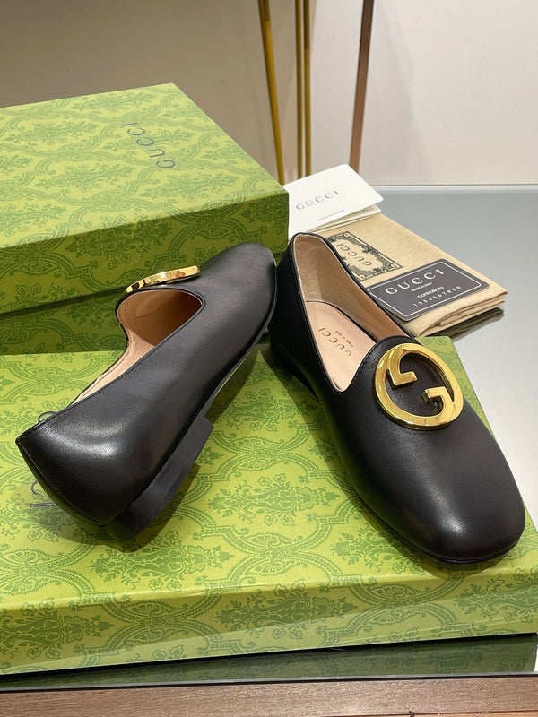 BLONDIE LOGO-PLAQUE LOAFERS IN BLACK CALFSKIN