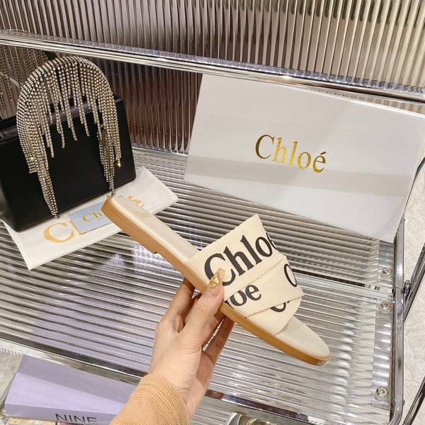 CHLOÉ WOODY SLIPPER IN BEIGE MIX BLACK CANVAS