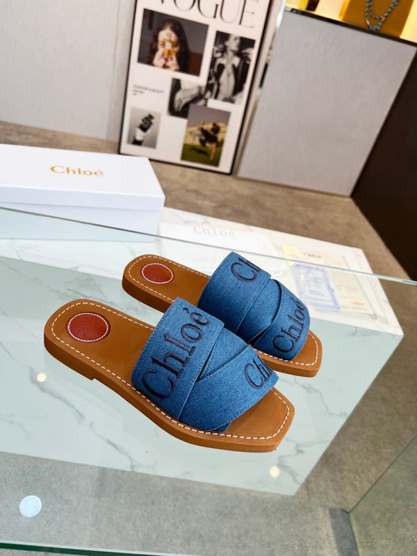 CHLOÉ WOODY MULE IN COBALT BLUE DENIM WITH EMBROIDERED LOGO