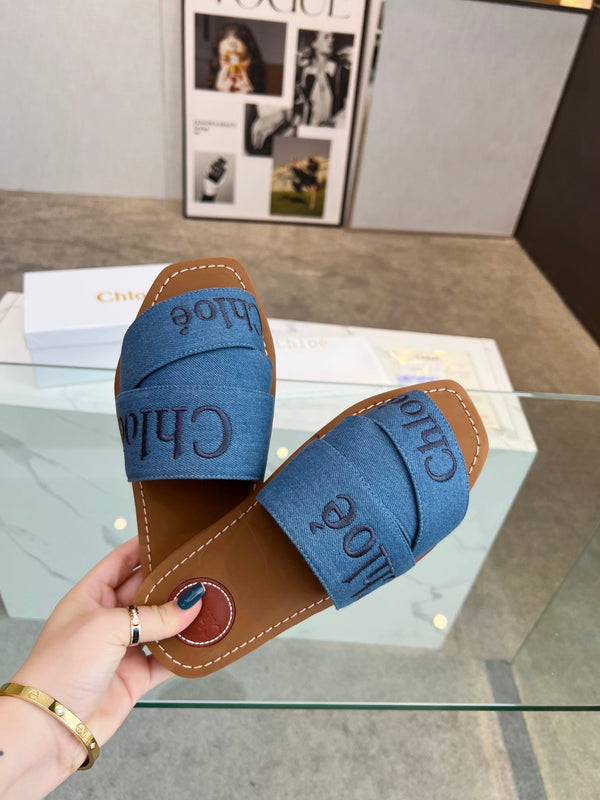 CHLOÉ WOODY MULE IN COBALT BLUE DENIM WITH EMBROIDERED LOGO