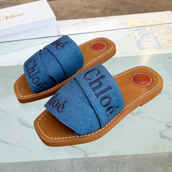CHLOÉ WOODY MULE IN COBALT BLUE DENIM WITH EMBROIDERED LOGO