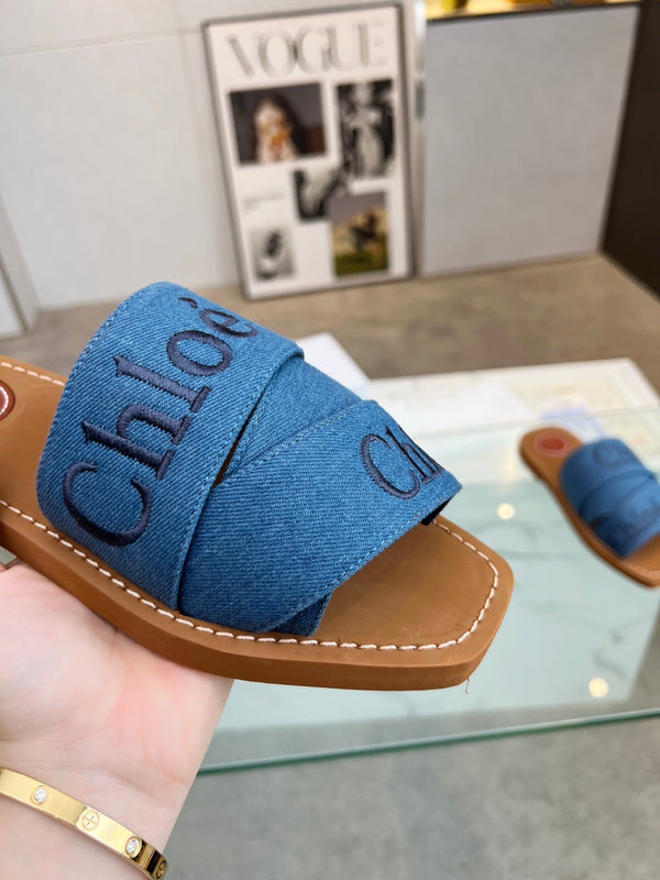 CHLOÉ WOODY MULE IN COBALT BLUE DENIM WITH EMBROIDERED LOGO