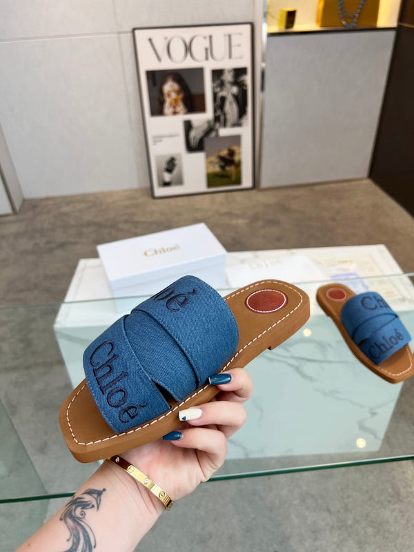 CHLOÉ WOODY MULE IN COBALT BLUE DENIM WITH EMBROIDERED LOGO