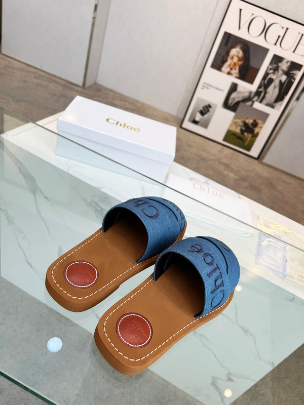 CHLOÉ WOODY MULE IN COBALT BLUE DENIM WITH EMBROIDERED LOGO
