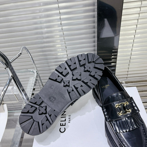 MARGARET CHUNKY LOAFER WITH FRINGES AND TRIOMPHE CHAIN IN POLISHED BULL BLACK