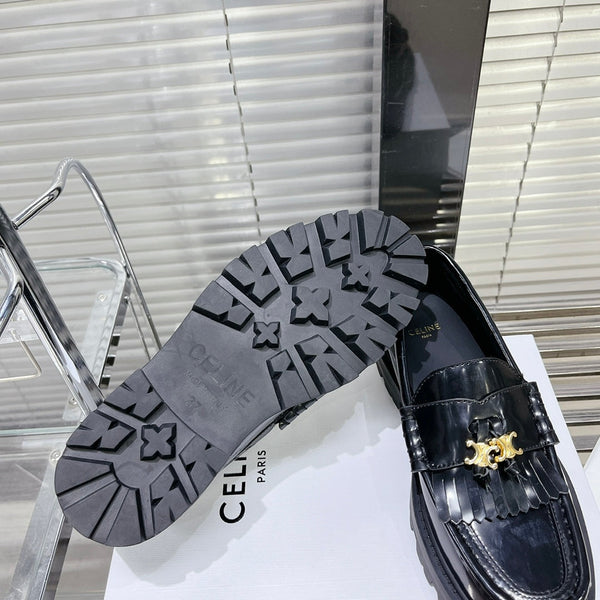 MARGARET CHUNKY LOAFER WITH FRINGES AND TRIOMPHE CHAIN IN POLISHED BULL GLOSSY BLACK