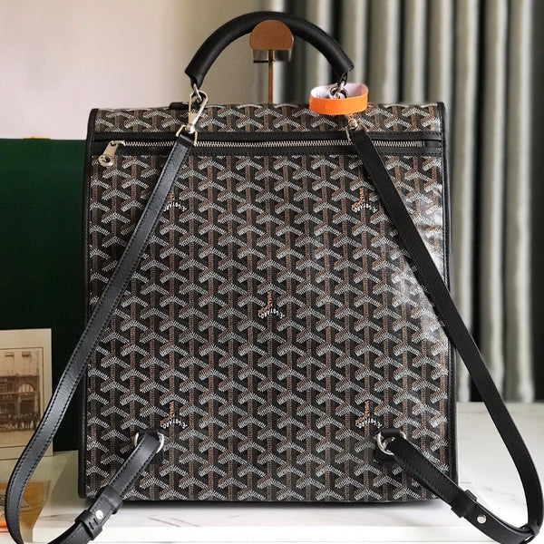 ZAINO SAINT LÉGER 35 IN TELA GOYARDINE E PELLE DI VITELLO COLOR MARRONE MIX NERO CON PATCH CARTONI ANIMATI