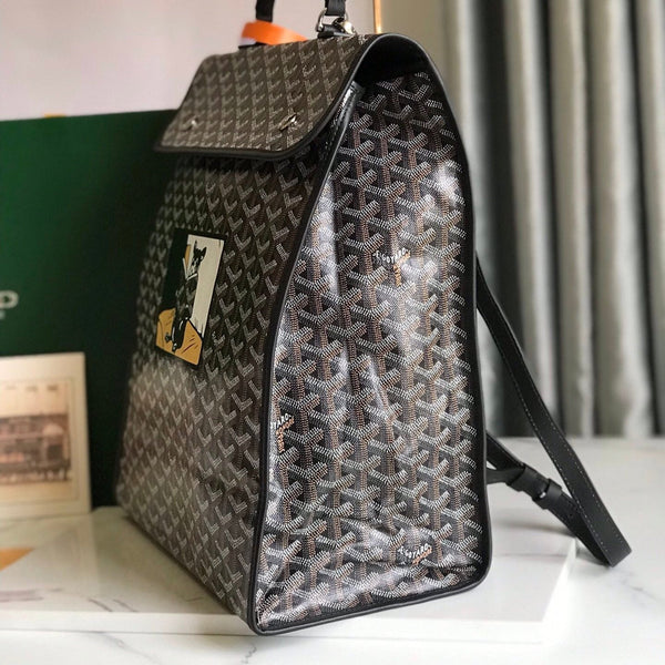 ZAINO SAINT LÉGER 35 IN TELA GOYARDINE E PELLE DI VITELLO COLOR MARRONE MIX NERO CON PATCH CARTONI ANIMATI