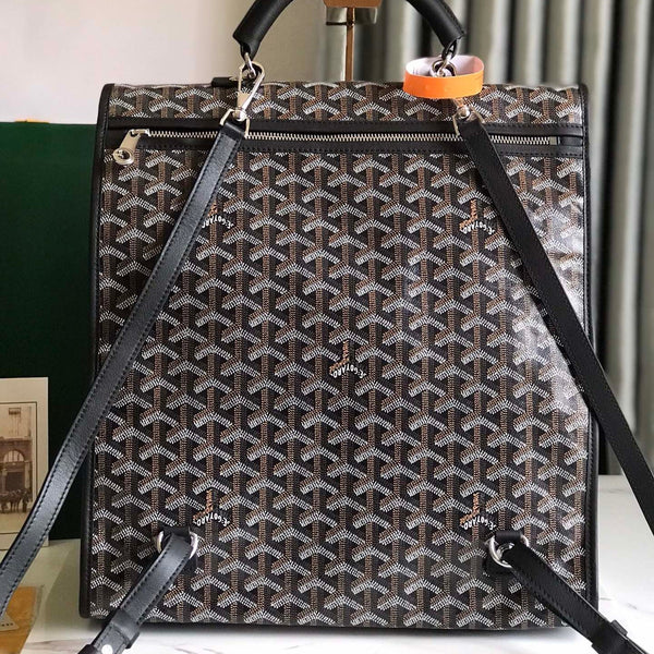 ZAINO SAINT LÉGER 35 IN TELA GOYARDINE E PELLE DI VITELLO COLOR MARRONE MIX NERO CON PATCH CARTONI ANIMATI