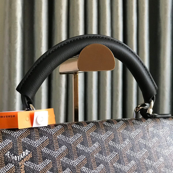 ZAINO SAINT LÉGER 35 IN TELA GOYARDINE E PELLE DI VITELLO COLOR MARRONE MIX NERO CON PATCH CARTONI ANIMATI