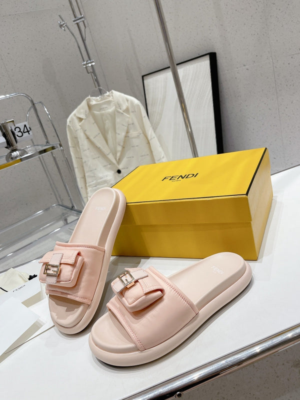 FENDI BAGUETTE SLIPPERS IN PASTEL PINK LAMBSKIN WITH GOLD HARDWARE