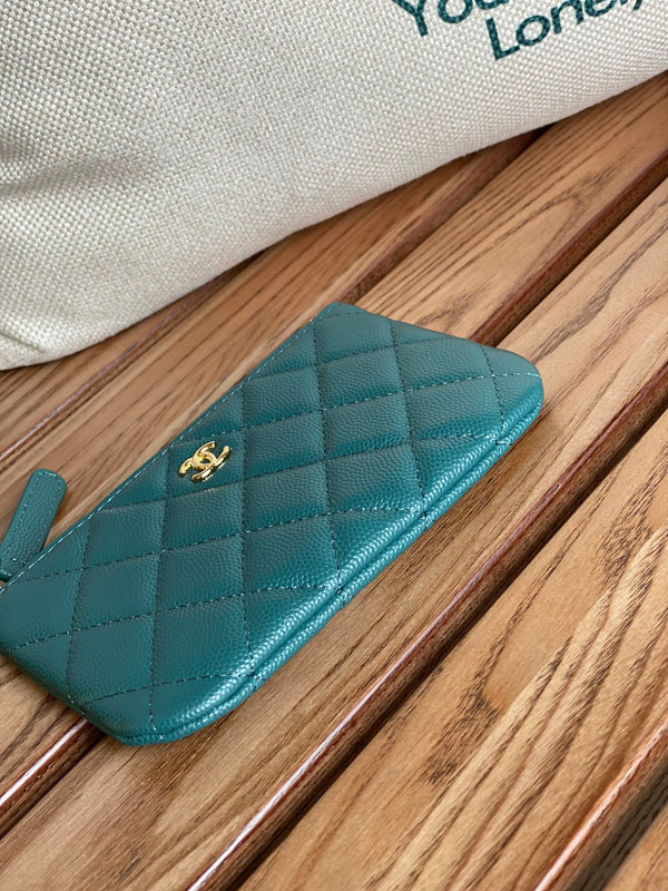 cc zipped wallet 15 blue green caviar gold hardware