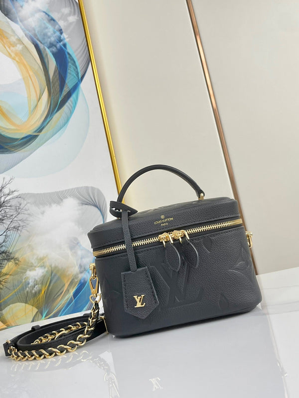 VANITY 19 IN PELLE DI VITELLO CON MONOGRAMMA IN RILIEVO NERO E FERRAMENTA ORO