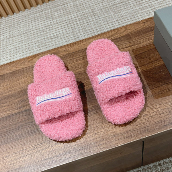 FURRY SLIDES IN PINK CURLY SHEARLING