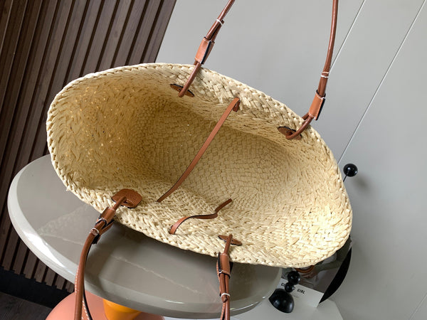 Medium anagram basket bag in iraca palm and calfskin