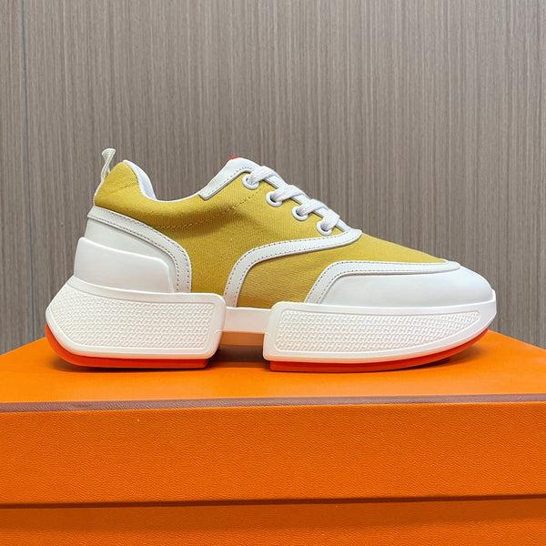 Sneaker HM Giga 50 in tela giallo sole, pelle di capra bianca e arancione