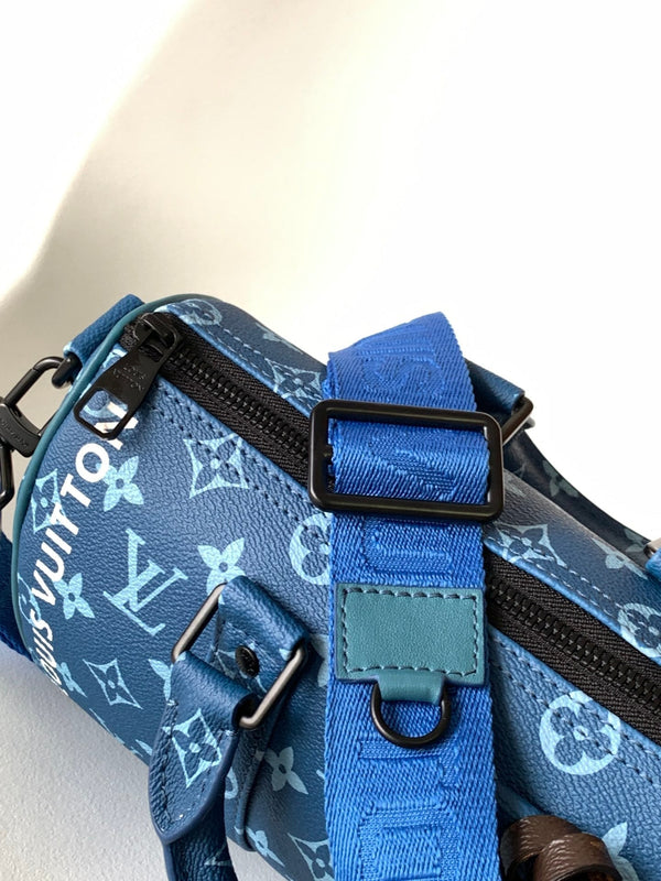 LV 21s Keepall Bandoulière 25 Blue Monogram Canvas & Cowhide