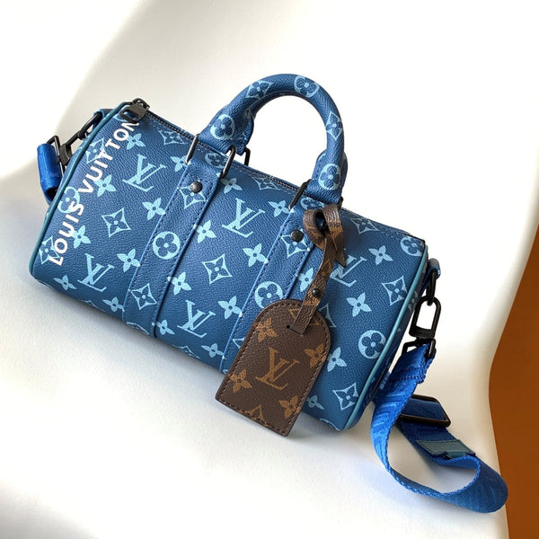 LV 21s Keepall Bandoulière 25 Blue Monogram Canvas & Cowhide