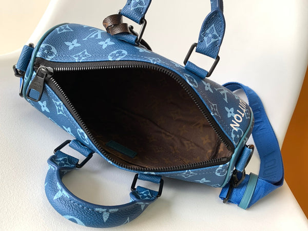 LV 21s Keepall Bandoulière 25 Blue Monogram Canvas & Cowhide