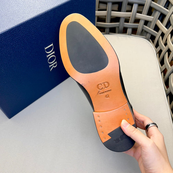 STIVALETTO CON LACCI CD HOMME IN PELLE DI VITELLO GOFFRATA NERA